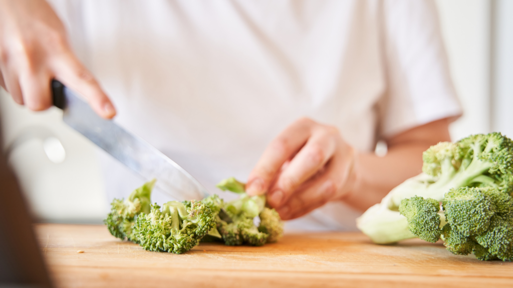 slicing broccoli for Broccoli and Red Lentil Soup