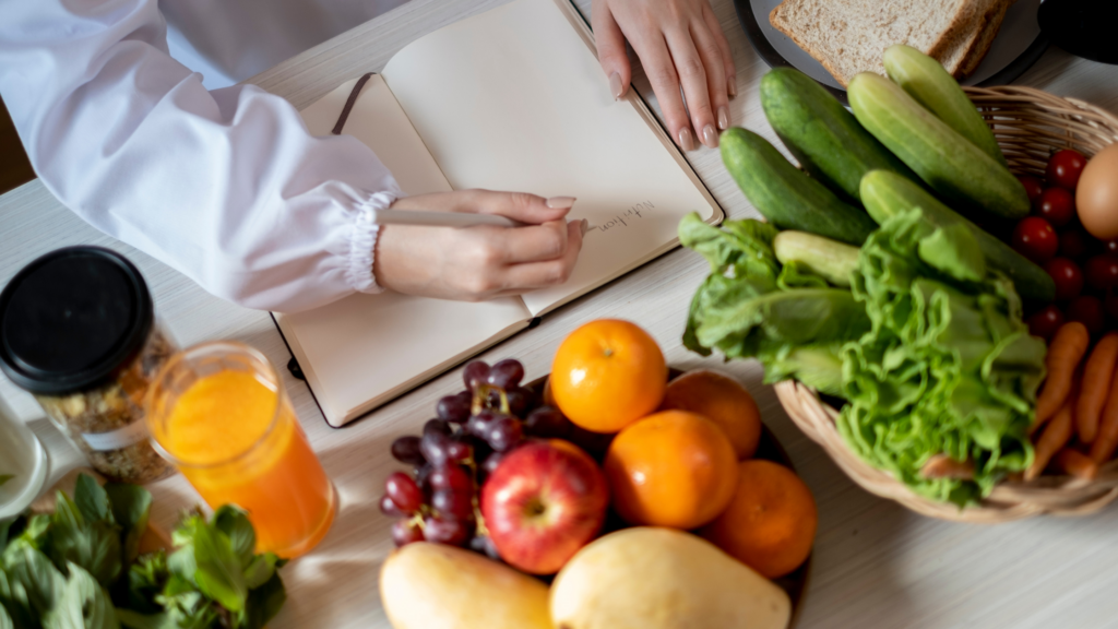 jotting down the role of nutrition in managing menopausal symptoms