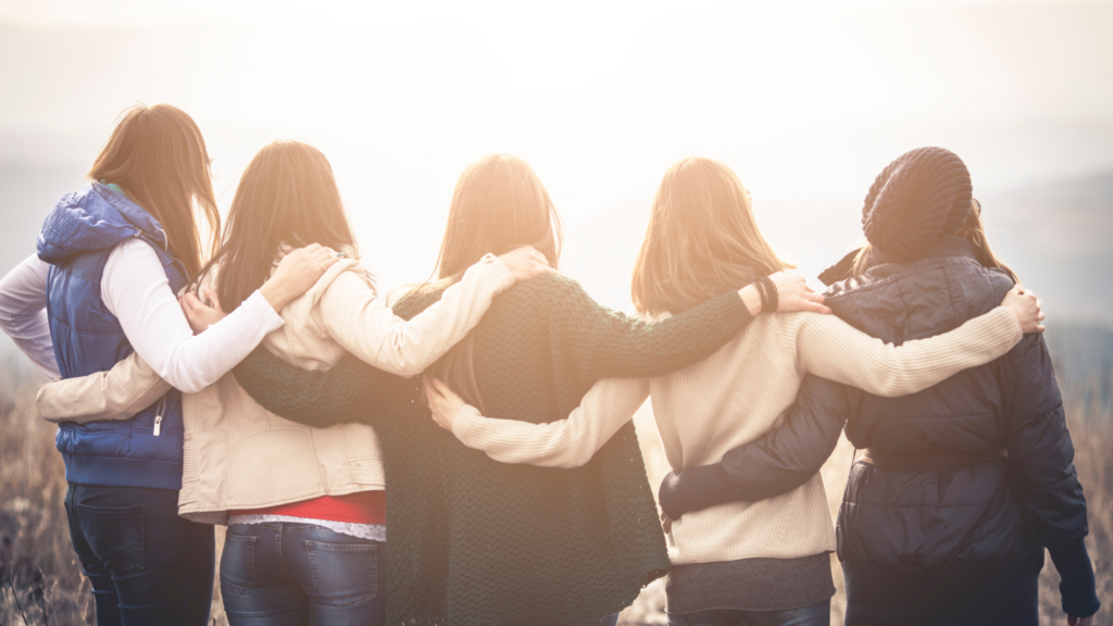 group of women embracing to emphasize mental health and menopause