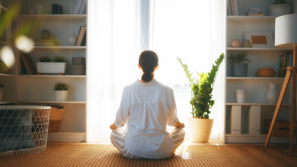 woman meditating to emphasize What Are The Five Stress Management Techniques