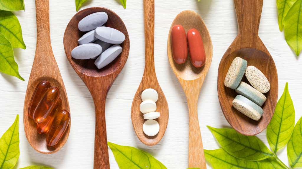 vitamins for menopause in different spoons