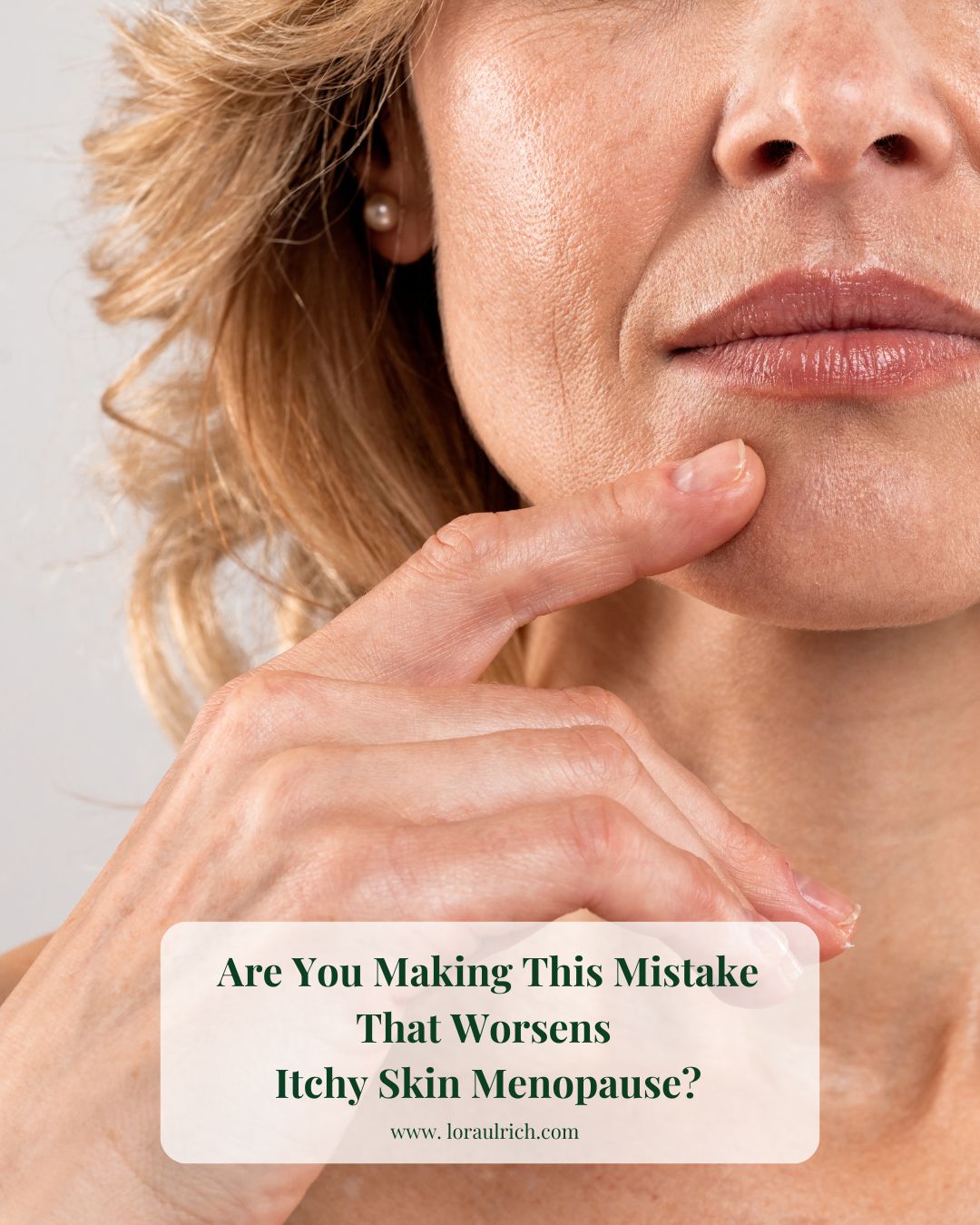 midlife woman touching her face, experiencing itchy skin in menopause
