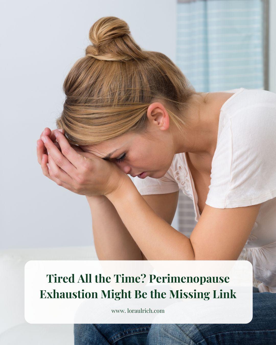 Exhausted woman resting her head in her hands, symbolizing the deep exhaustion common in peri menopause