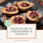 Baked pear halves filled with chopped walnuts and cranberries, garnished with cinnamon sticks on a dark plate.