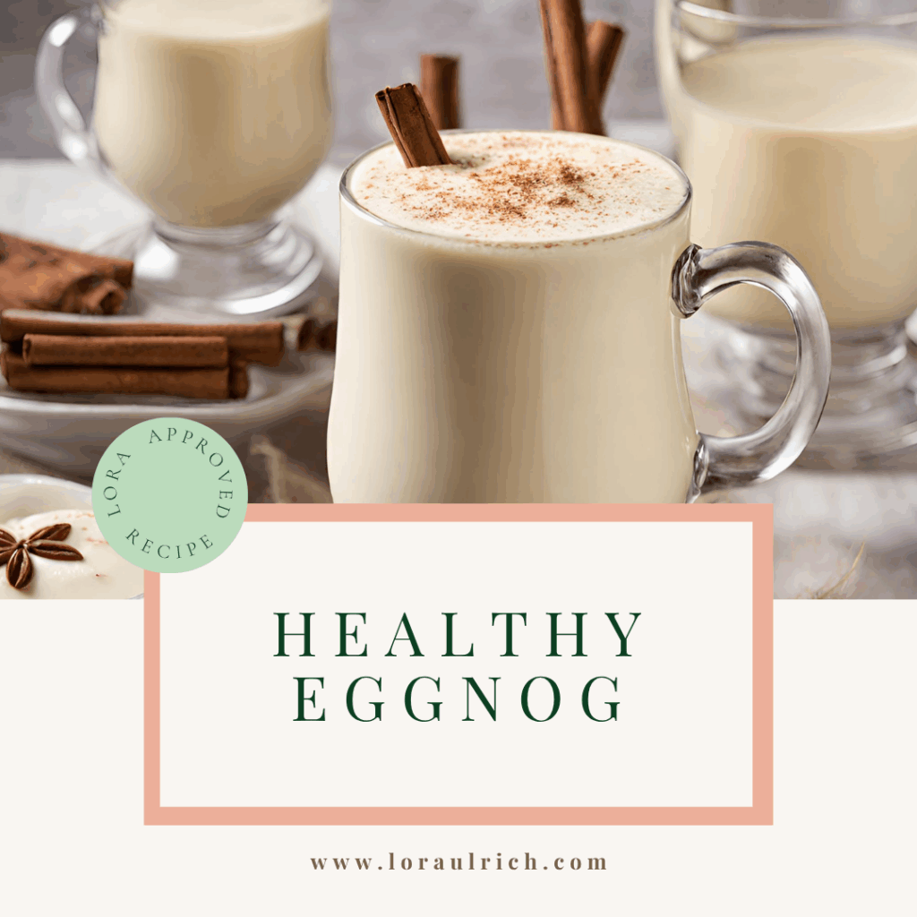 Creamy plant-based eggnog, topped with a sprinkle of cinnamon and garnished with a cinnamon stick