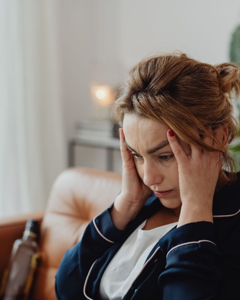 Woman in her 40s looking tense and overwhelmed, symbolizing emotional intensity during menopause rage.