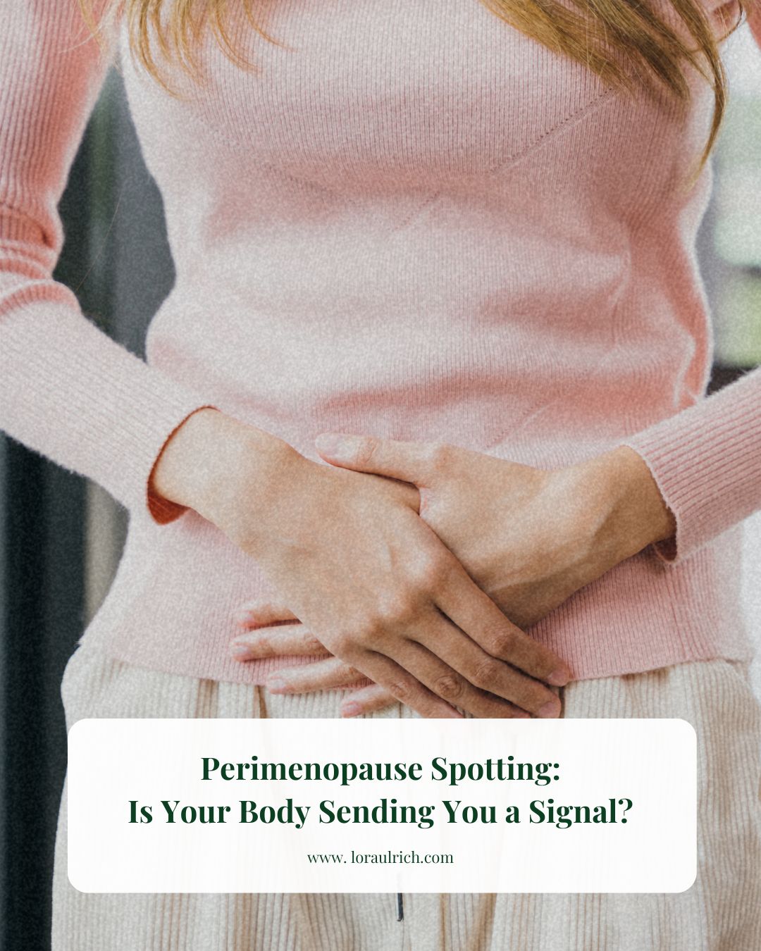 Woman with hands on stomach, illustrating reproductive health focus and midlife hormone changes.