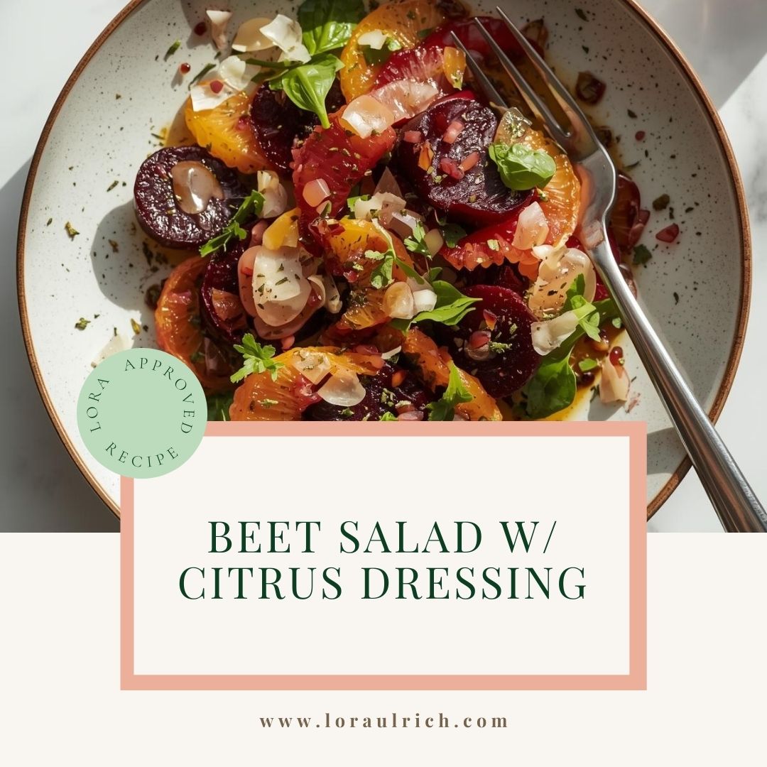 Colorful beet salad with citrus segments, leafy greens, and walnuts drizzled with light vinaigrette.