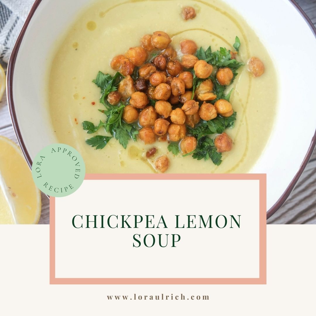 Creamy golden chickpea lemon soup topped with crispy chickpeas, fresh parsley, and a drizzle of olive oil in a white bowl.