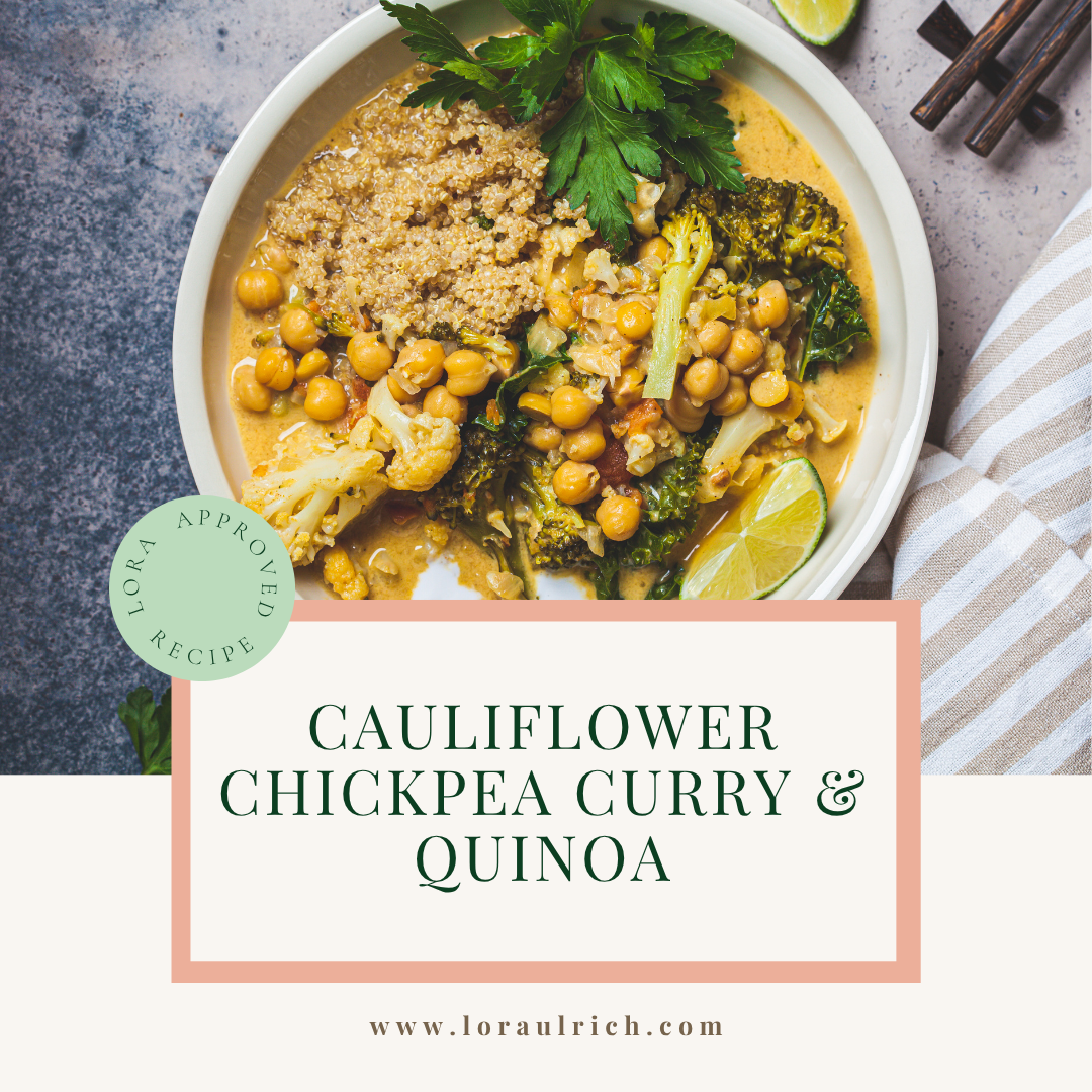 A nourishing bowl of cauliflower chickpea curry with quinoa, garnished with fresh herbs and lime, crafted as a hormone-friendly meal to support women in menopause.
