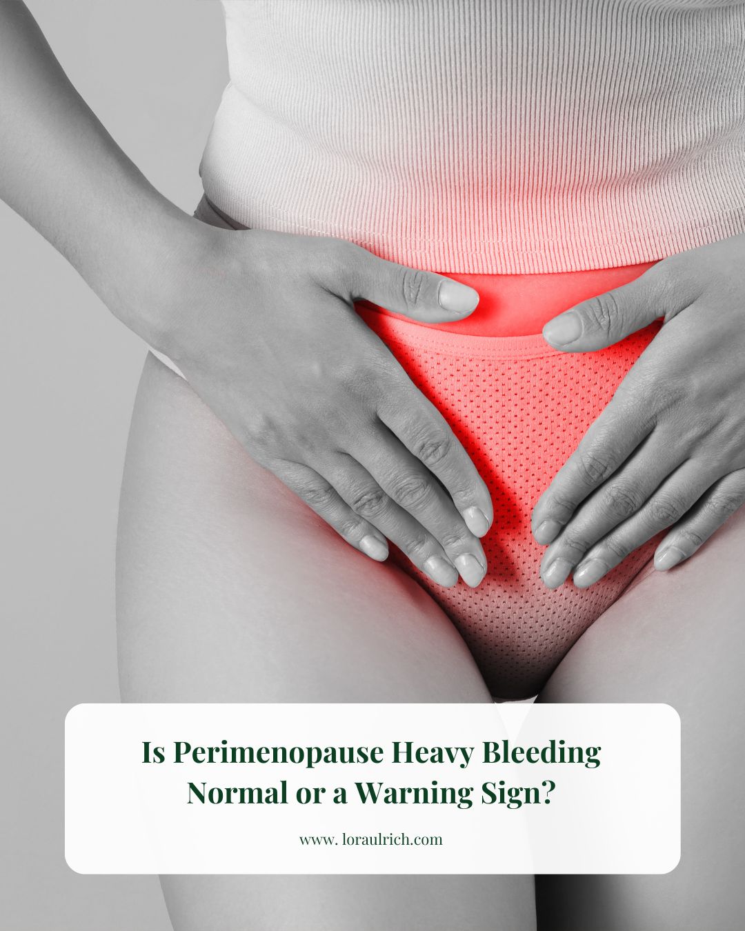 Midlife woman holding lower abdomen with red highlight indicating pelvic pain or discomfort, symbolizing perimenopause heavy bleeding.