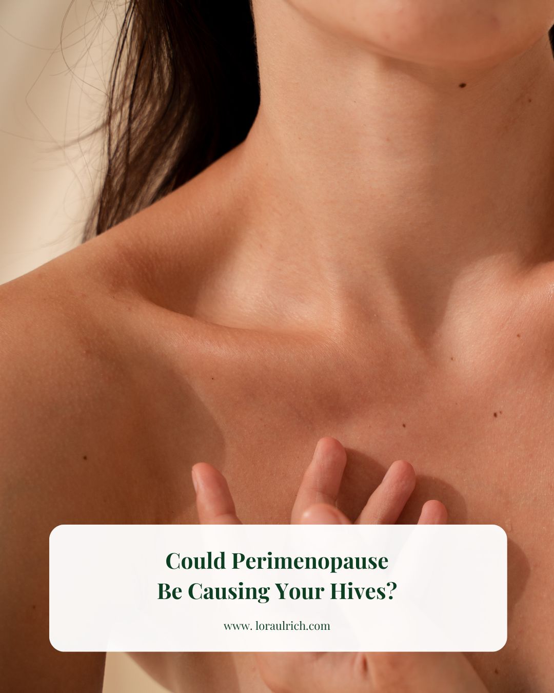 A close-up of a woman gently touching her skin on her collarbone and chest, representing relief from perimenopause hives through midlife coaching.