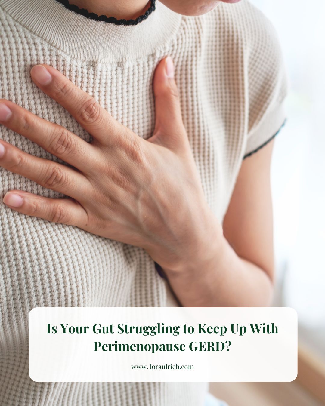 A midlife woman resting her hand on her chest while experiencing symptoms of GERD in perimenopause.