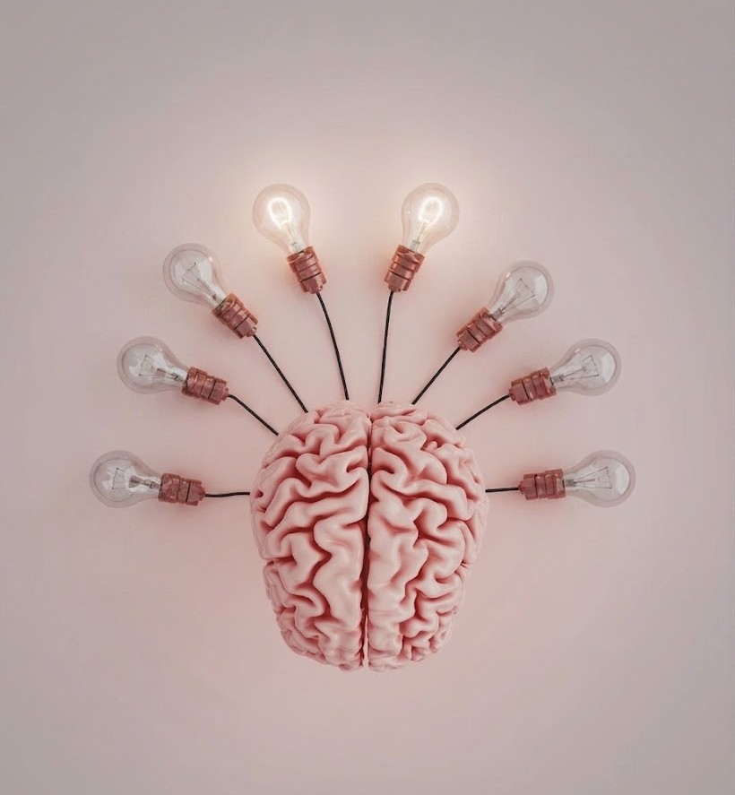 A conceptual illustration of a pink human brain with several surrounding light bulbs turned off and only two lit up, representing memory loss, brain fog, and mental fatigue.