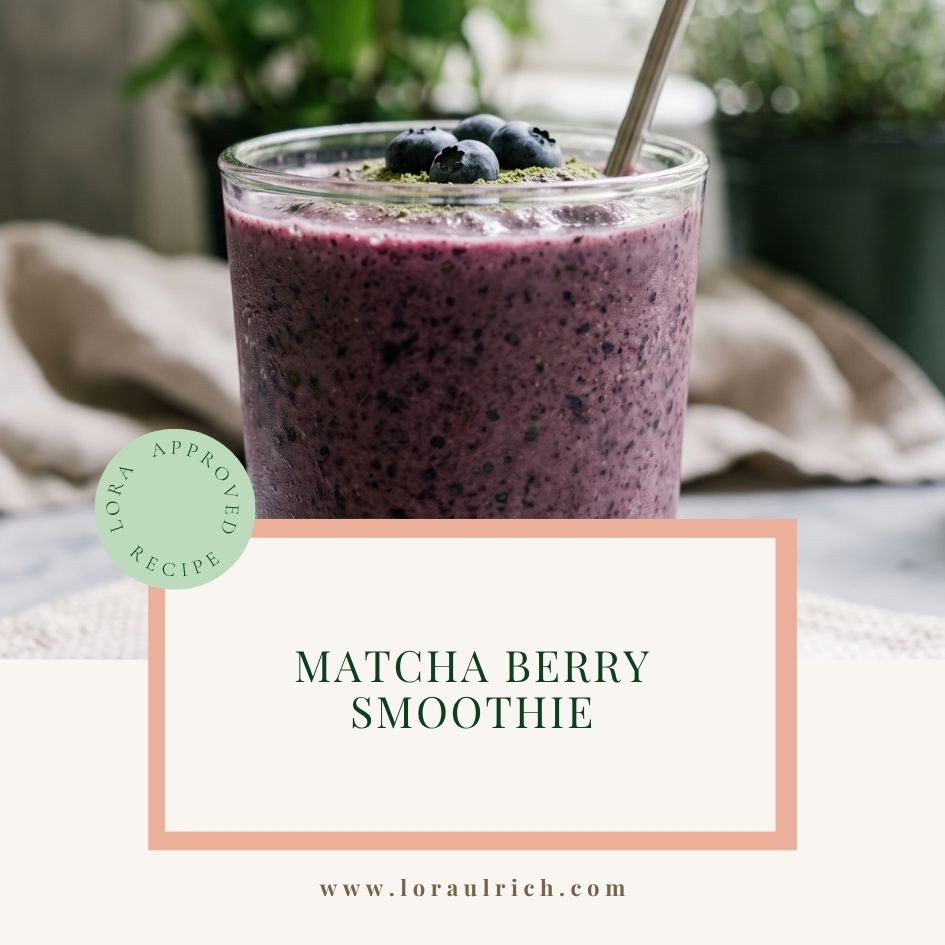 Vibrant blueberry matcha smoothie with a metal straw and blueberry topping, representing a dairy-free breakfast for midlife energy and health.