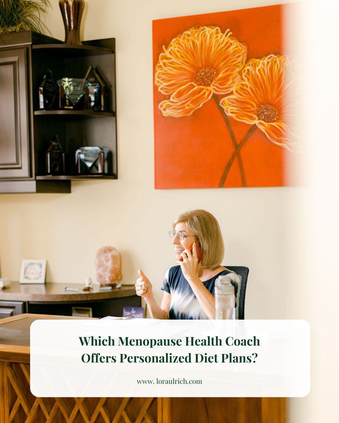 Lora Ulrich, a menopause health coach, working at her desk during a personalized client consulting call.