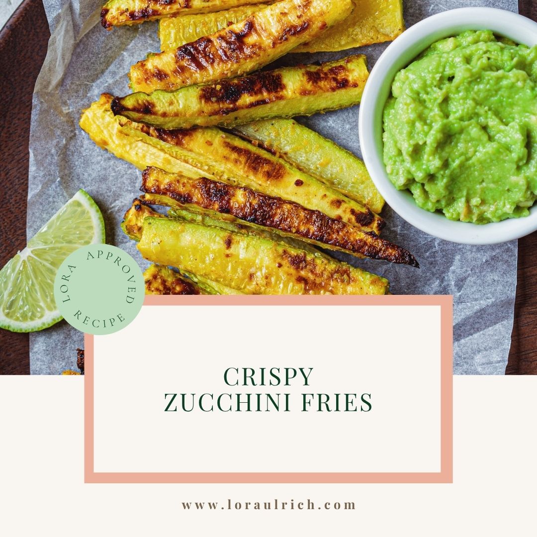 Crispy air fryer zucchini fries served with green avocado dip.